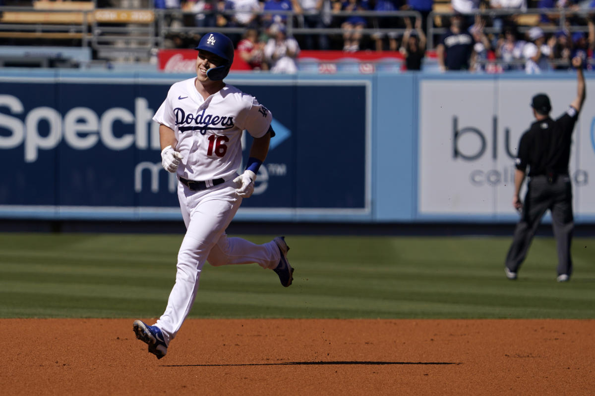 San Diego Padres' Luke Voit scores on a sacrifice fly by Austin