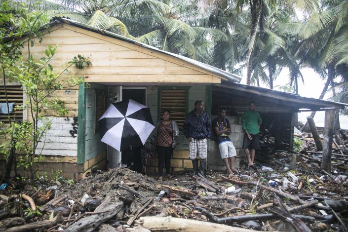 <p>A home is surrounded by debris brought in by Hurricane Irma in Nagua, Dominican Republic, Sept. 7, 2017. (Photo: Tatiana Fernandez/AP) </p>