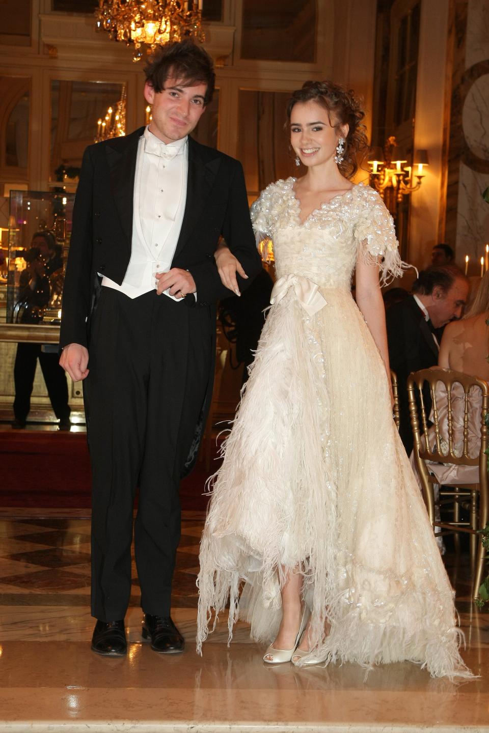 Lily Collins pictured with her cavalier Richard Dennen at Le Bal in 2007.