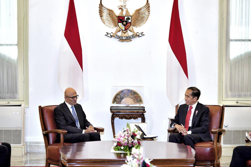 In this photo released by Indonesian Presidential Palace, Microsoft CEO Satya Nadella, left, meets with Indonesia President Joko Widodo at Merdeka palace in Jakarta, Indonesia, Tuesday, April 30, 2024. Microsoft will invest $1.7 billion over the next four years in new cloud and AI infrastructure in Indonesia, the single largest investment in Microsoft’s 29-year history in the country, said Nadella, on Tuesday. (Vico/Indonesian President Palace via AP)