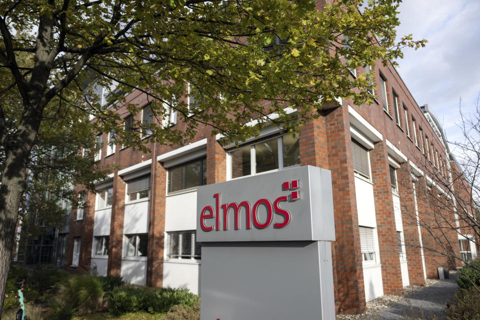 The company logo is seen by the building of the Elmos Semiconductor SE company in Dortmund, Germany, on Wednesday, Nov. 9, 2022. The German government on Wednesday blocked the sale of a chip factory to a Swedish subsidiary of a Chinese company, a decision that comes as Berlin grapples with its future approach to Beijing. (Bernd Thissen/dpa via AP)