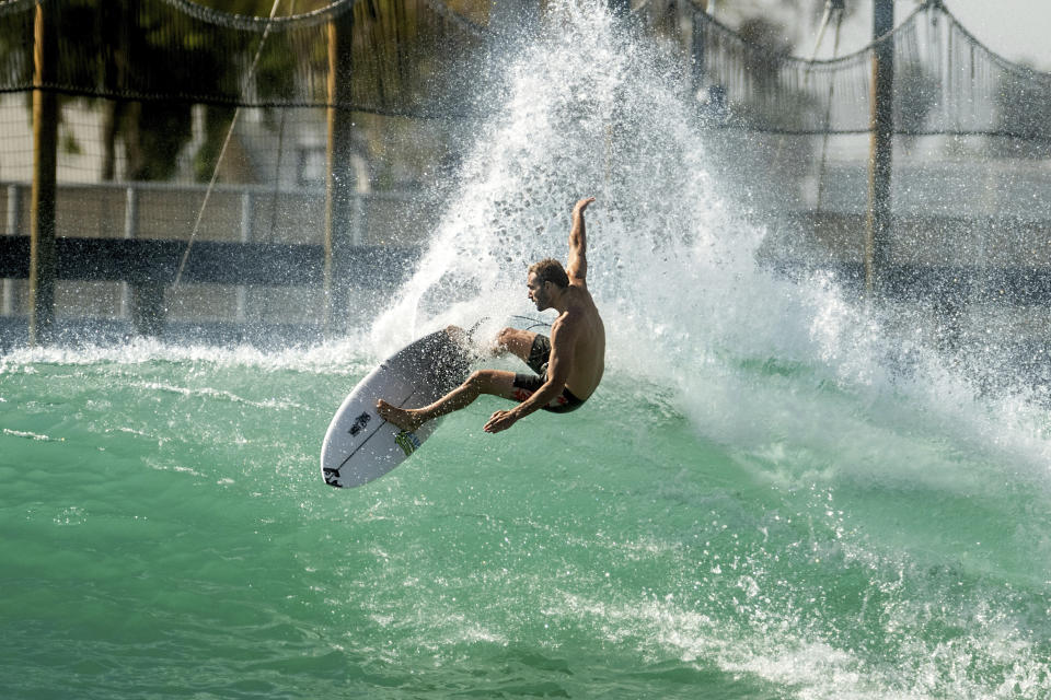 FILE - In this Tuesday, June 15, 2021 file photo, Portuguese surfer Frederico Morais practices for a World Surf League competition at Surf Ranch, in Lemoore, Calif. Portugal's Olympic team says that surfer Frederico Morais will miss the Games after having tested positive for the coronavirus despite being vaccinated. The team says that Morais won’t travel to Tokyo on Friday, July 23, 2021 as planned. The 29-year-old Morais qualified for the Games after finishing as the top-ranked European surfer at the 2019 World Surfing Games held in Japan. (AP Photo/Noah Berger, File)