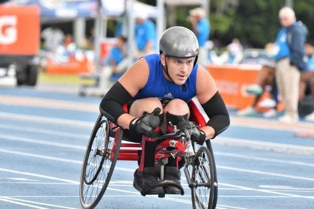 Sebastian River senior Aaron Pena competes at the FHSAA adaptive track and field championships on May 14, 2022 at the University of Florida. Pena, born with spina bifida, won state titles in both the 200 and 800-meter dash while dealing with symptoms of long COVID-19 the past two years.