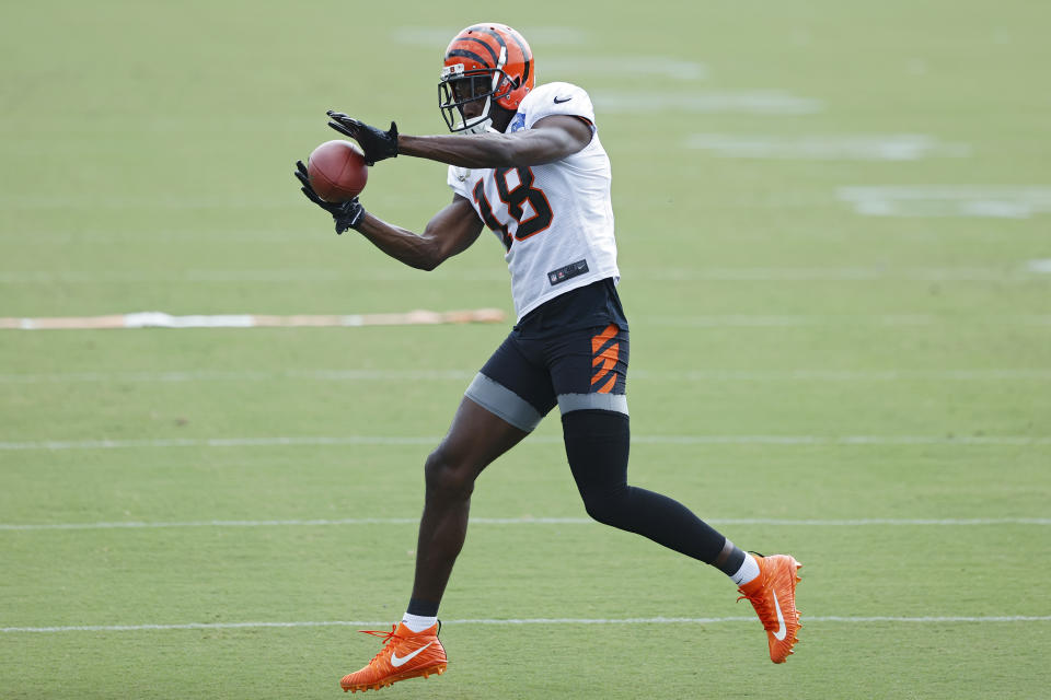 A.J. Green #18 of the Cincinnati Bengals catches a pass during training camp workouts 