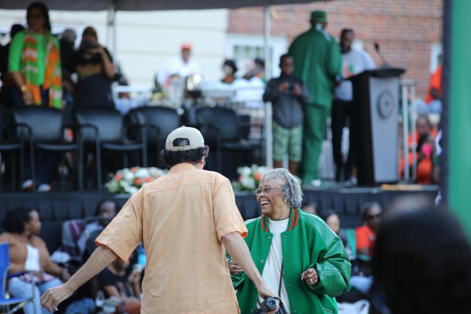 Rattler fans dancing while waiting to watch FAMU's 2023 Homecoming parade on Saturday, Oct. 28.