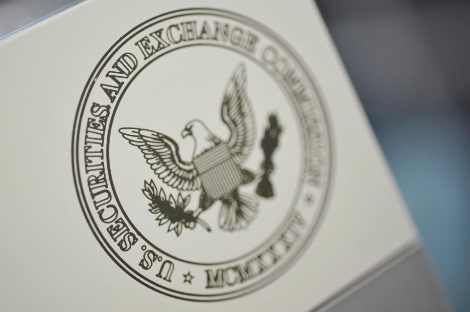 FILE PHOTO: The U.S. Securities and Exchange Commission logo adorns an office door at the SEC headquarters in Washington, June 24, 2011.   REUTERS/Jonathan Ernst/File Photo