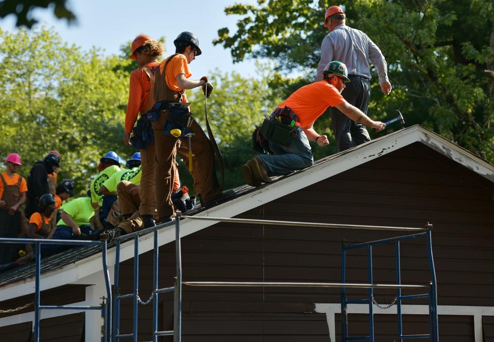 Students with Job Corps showed up at Camp Atwater in North Brookfield with tools in hand to help spruce the place up Wednesday. The historic camp dates back to 1921.