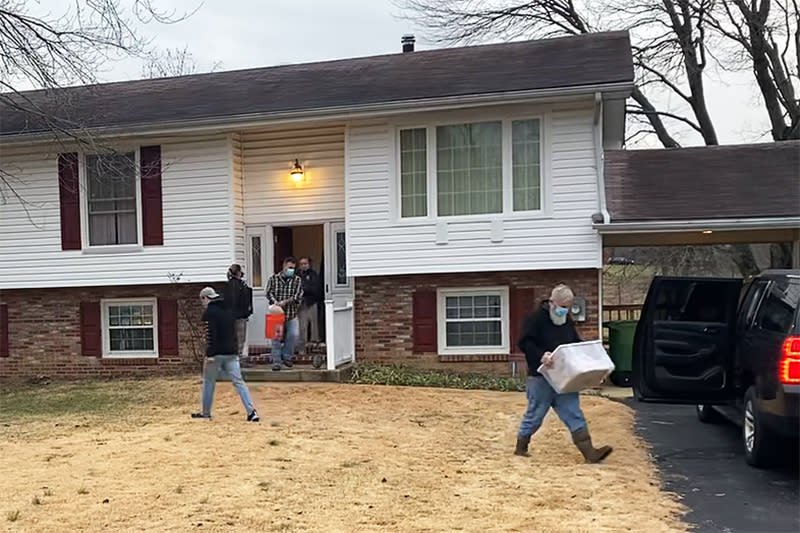 Image: Officials remove snakes from a home in Maryland. (Charles County Government)