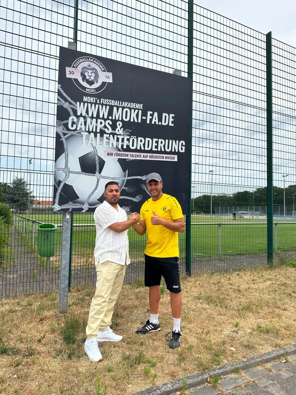 Chris Hernandez (left) and  Yousef Mokhtari (right) pose for a photo during one of the days of the Moki Fussballakademie soccer youth trial in Germany.