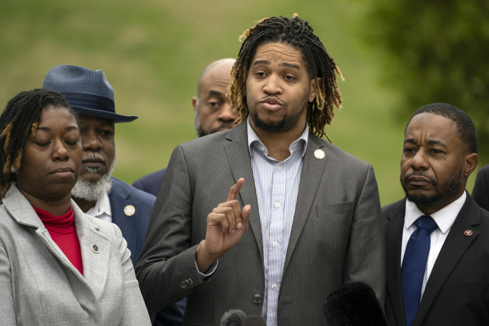 State Rep. Torrey Harris, D-Memphis, of the Tennessee Black Caucus of State Legislators responds to questions during a press conference outside the state Capitol, Friday, April 7, 2023, in Nashville, Tenn. the day after two of its members were expelled from the state's House of Representatives. (AP Photo/George Walker IV)