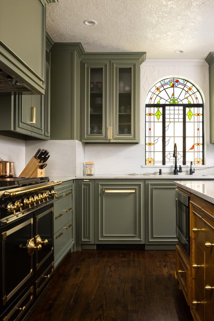 Think of mossy green as a moody neutral per this Maestri Studio kitchen project.