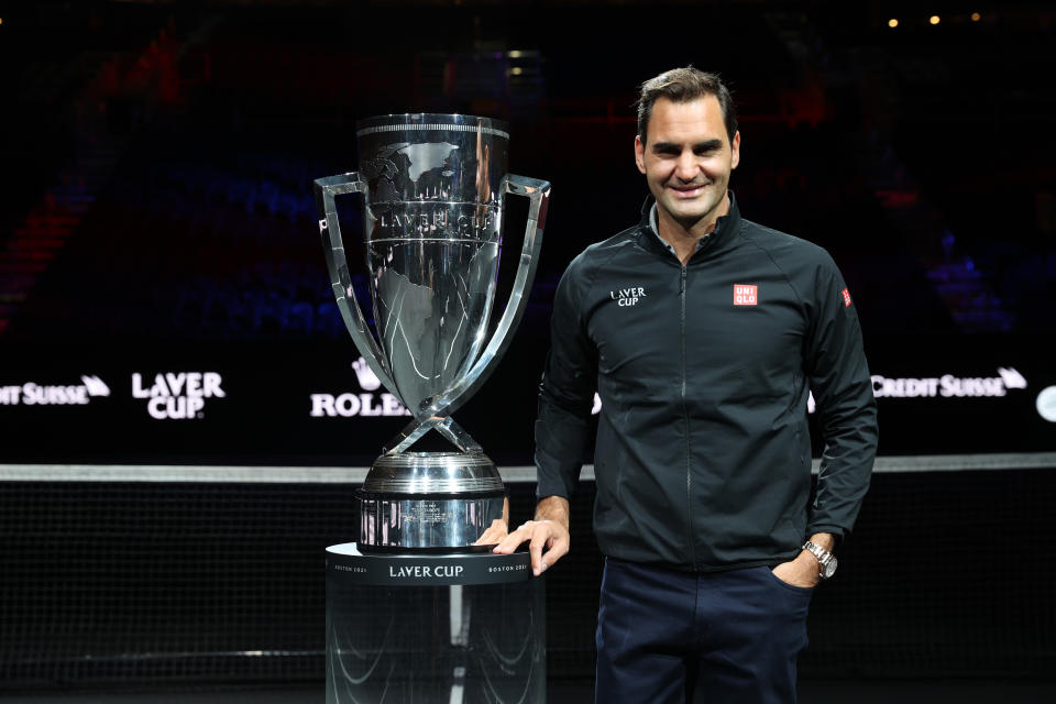 Roger Federer (pictured) poses for a photo with the Laver Cup Trophy.