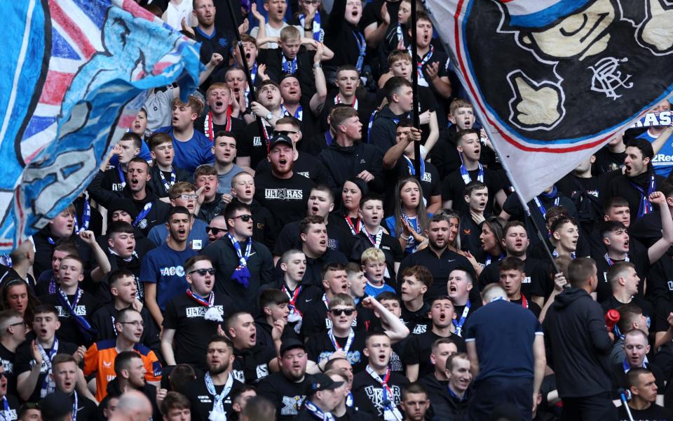 Rangers supporters during an Old Firm derby match at Ibrox in May last year