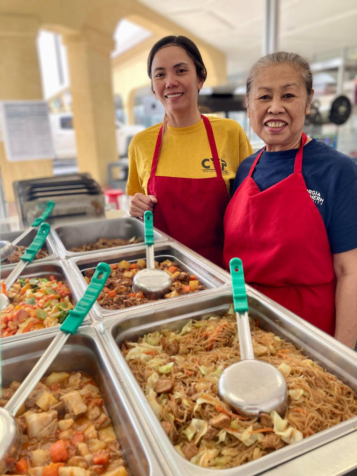 From left to right, Lorena Ferguson, owner, and Delia Tropel, at Lor’s Philippine Cuisine in Warner Robins.