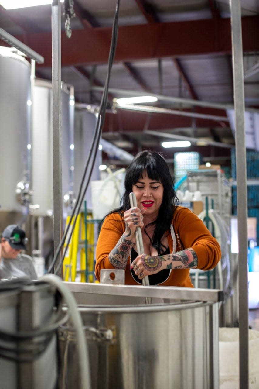 Val Ronin works on the beer at 3 Sheeps Brewing, which has two specials for Women's History Month.
