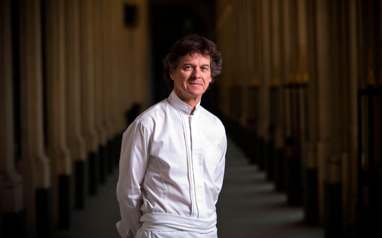 Star-studded French Chef Guy Martin poses outside his restaurant "Le Grand Vefour" in Paris. - LIONEL BONAVENTURE/AFP