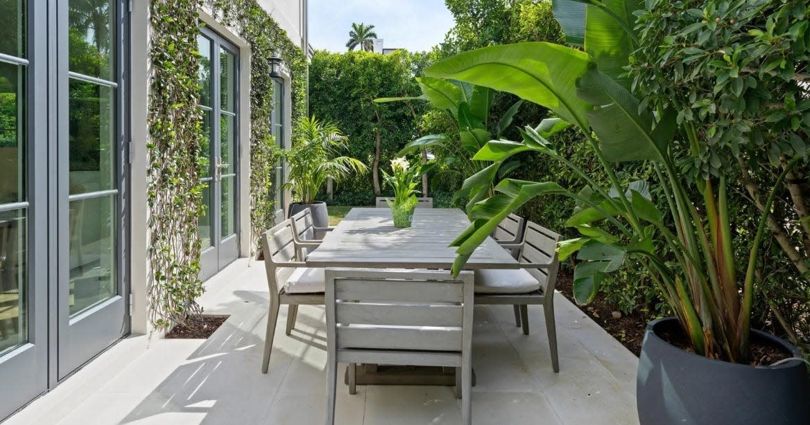 A Palm Beach house with an outdoor dining patio at 221 Oleander Ave. was lIsted for sale last season at about $7.9million. It just sold off market for a recorded $7.1 million.