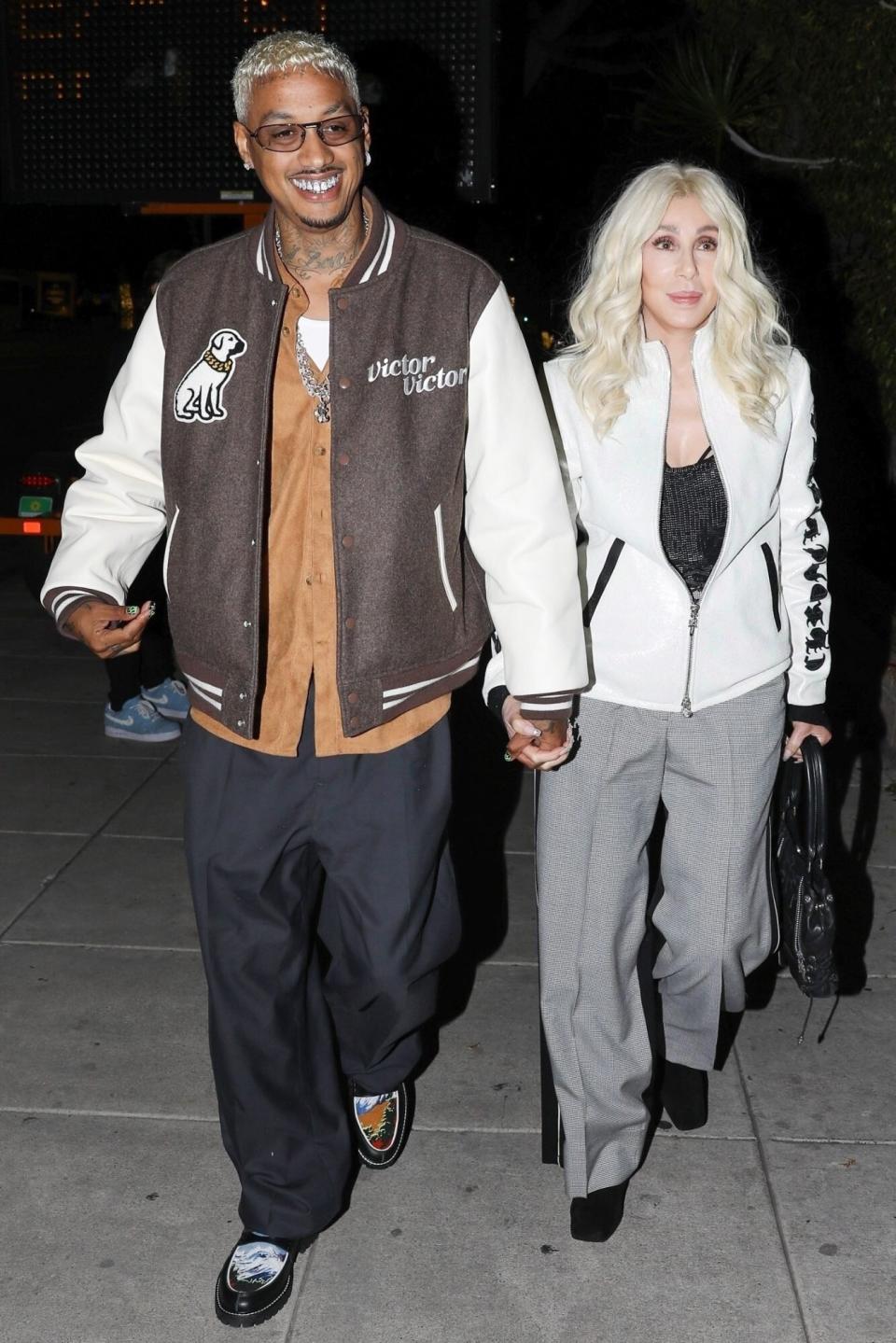 Beverly Hills, CA - *EXCLUSIVE* Cher and Alexander Edwards arrive for a pre-Grammy party at Matsuhisa restaurant in Beverly Hills. Pictured: Cher, Alexander Edwards BACKGRID USA 3 FEBRUARY 2023 BYLINE MUST READ: The Hollywood JR / BACKGRID USA: +1 310 798 9111 / usasales@backgrid.com UK: +44 208 344 2007 / uksales@backgrid.com *UK Clients - Pictures Containing Children Please Pixelate Face Prior To Publication*