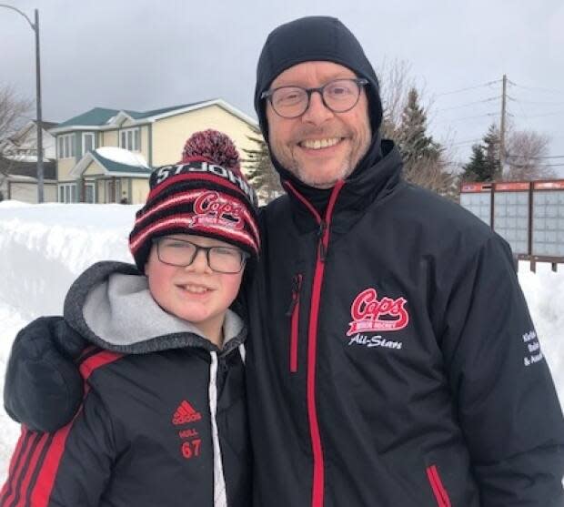 Sam and his dad, Rob.  Sam dedicated his Shave for the Brave fundraiser to his dad this year after he passed away from cancer in February.