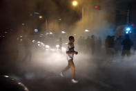 <p>Anti-Trump protesters block the streets following a rally and speech by Republican presidential candidate Donald Trump at the Albuquerque Convention Center in Albuquerque, N.M., Tuesday, May 24, 2016. (AP Photo/Brennan Linsley) </p>