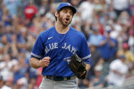 Toronto Blue Jays relief pitcher Jordan Romano celebrates the win over the Minnesota Twins at a baseball game Sunday, Aug. 7, 2022, in Minneapolis. The Blue Jays won 3-2 in 10 innings. (AP Photo/Bruce Kluckhohn)