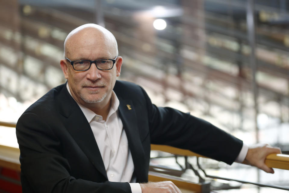 FILE - This Feb. 17, 2016 file photo shows Alex Gibney, director of the FIlm "Zero Days" posing at the 2016 Berlinale Film Festival in Berlin, Germany. Producers of Gibney’s “No Stone Unturned” have pulled the documentary about the 1994 murder of six men in Northern Ireland from the Tribeca Film Festival over legal issues. The film was to premiere April 23 at the festival. (AP Photo/Axel Schmidt, File)