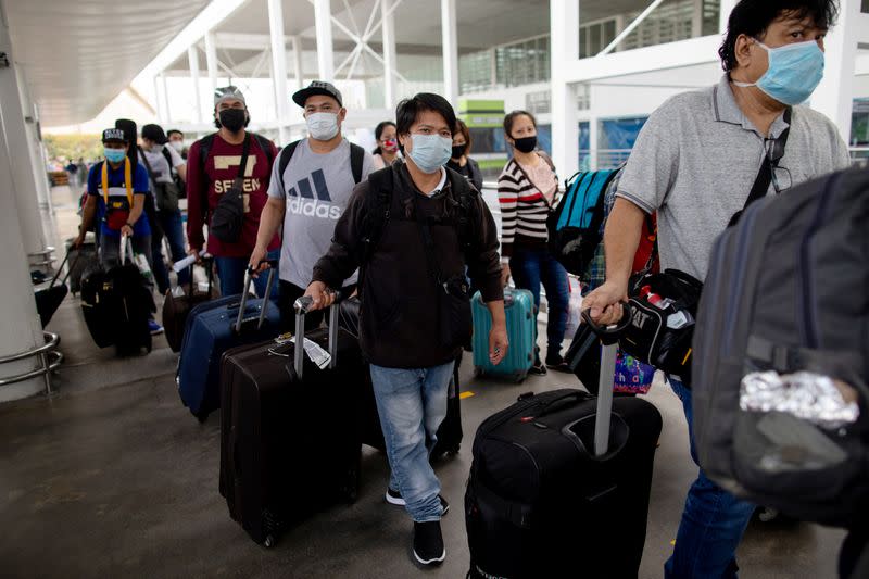 Repatriated Filipino workers stuck in quarantine amid the spread of the coronavirus disease (COVID-19) finally allowed to go home, in Pasay