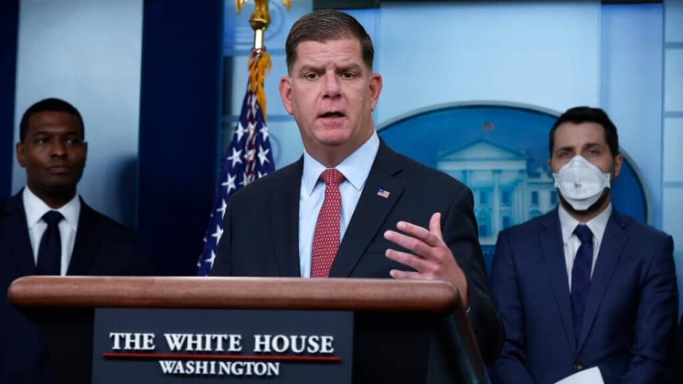 Labor Secretary Marty Walsh (C) speaks during a news conference marking six months since the signing of the bipartisan infrastructure bill with Environmental Protection Agency Administrator Michael Regan (L) and National Economic Council Director Brian Deese in the Brady Press Briefing Room at the White House on May 16, 2022 in Washington, DC. (Photo by Chip Somodevilla/Getty Images)