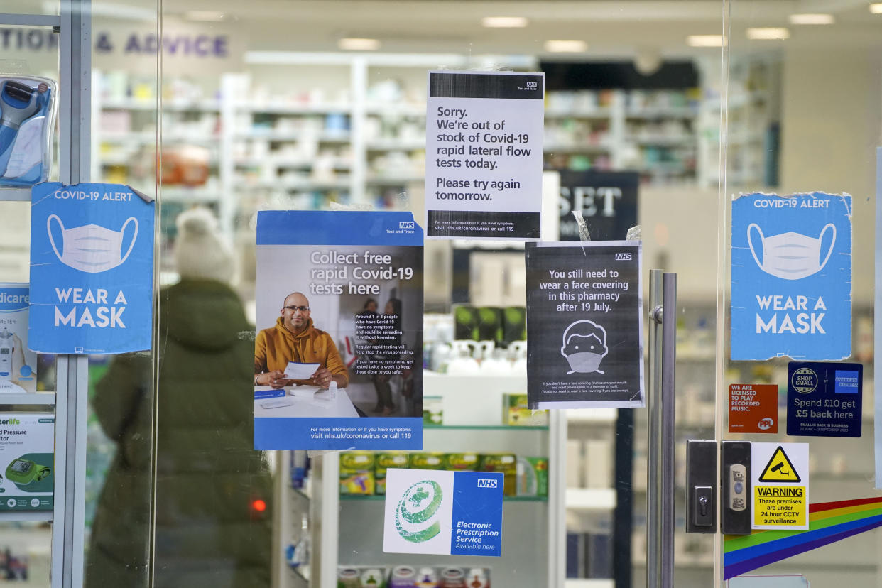 A pharmacy in Chertsey, Surrey, displays a sign saying that they have no lateral flow tests available. Picture date: Monday January 10, 2022.