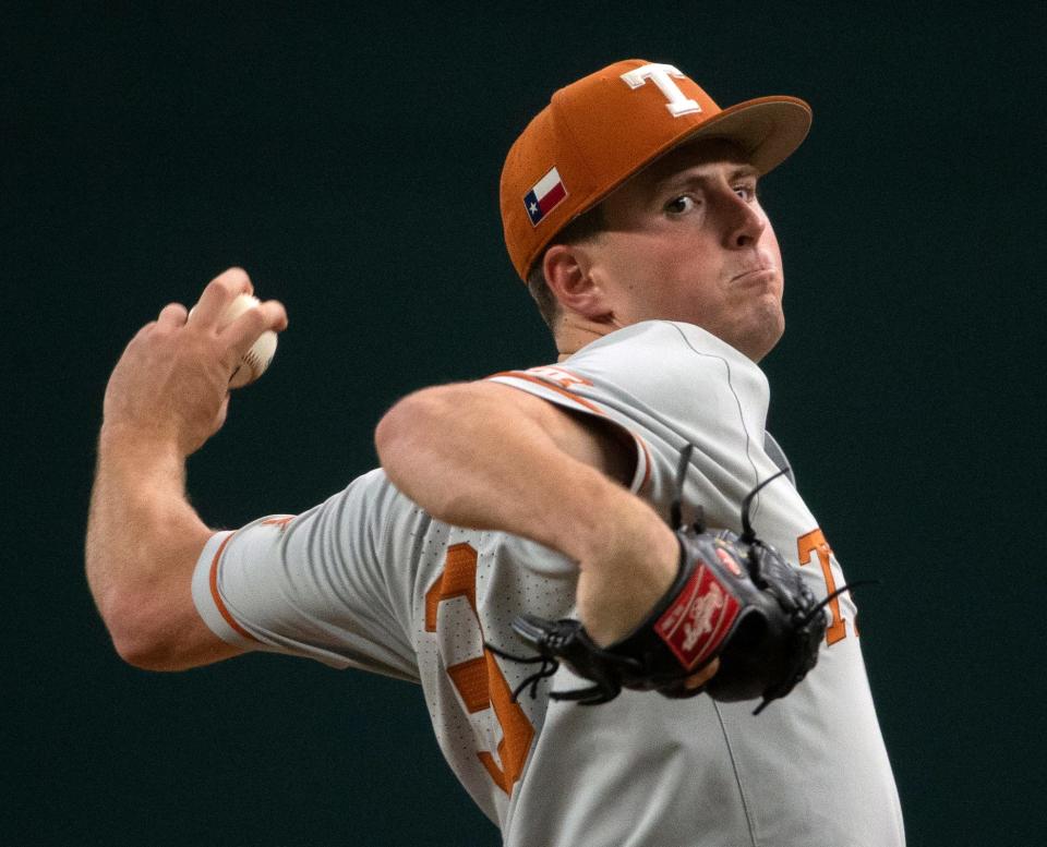 Texas' Pete Hansen (33) pitches against the Oklahoma State during the first-round Big 12 tournament game, Wednesday, May 25, 2022, at Globe Life Field in Arlington. Texas won, 4-0.