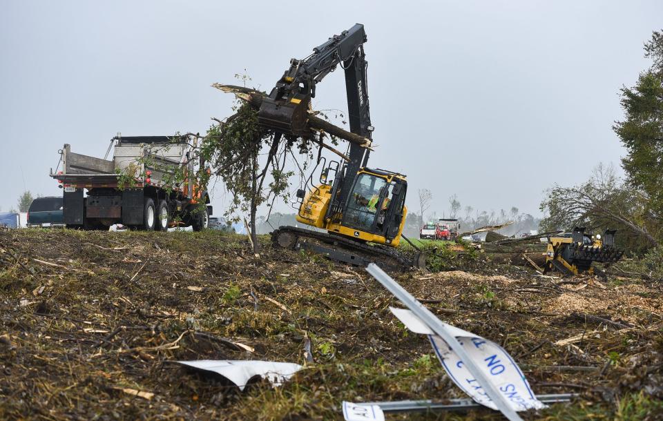 Michigan Dept. of Transportation crews work alongside eastbound I-96 near Webberville, Wednesday, Sept. 6, 2023, clearing away fallen trees and debris following the EF2 tornado on Aug. 24 that swept through Ingham County.