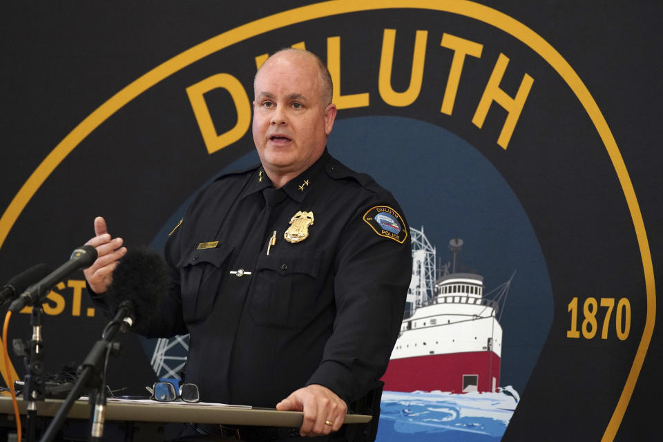 Duluth Police Chief Mike Tusken speaks from the podium during a press conference to speak about the scene the day prior where five people and a dog were found dead of gunshot wounds inside a home on East 12th Street after police received a report of a male experiencing a mental health crisis Thursday, April 21, 2022, in Duluth, Minn. Tusken said at the news conference that Brandon Taylor Cole-Skogstad, 29, killed his relatives in their beds sometime Tuesday night, and then shot himself as police knocked on the door around 12:30 p.m. Wednesday. (Anthony Souffle/Star Tribune via AP)