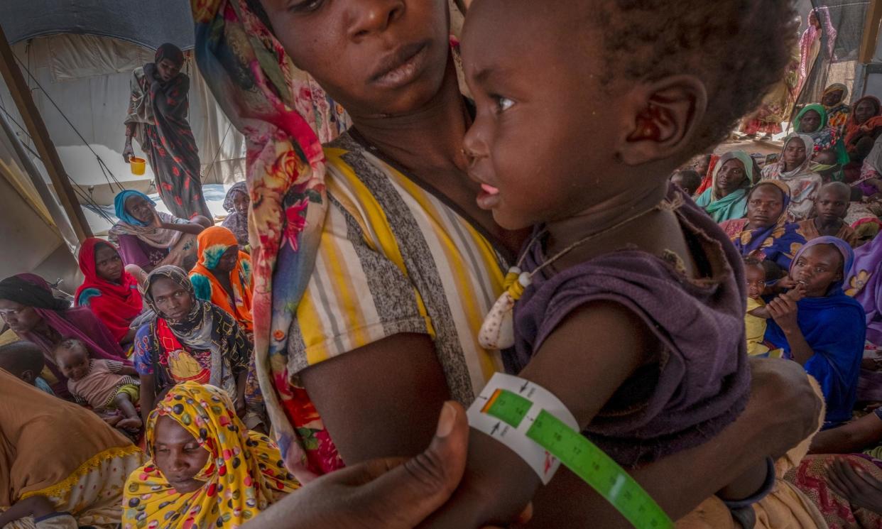 <span>A Sudanese refugee child receives medical treatment in the Ambelia refugee camp near Adré on 5 April.</span><span>Photograph: Ricardo Garcia Vilanova/EPA</span>