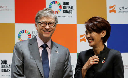 Bill Gates, co-chair of the Bill & Melinda Gates Foundation, and Yuko Arimori, two time Olympic marathon medalist attend a news conference as the foundation teams up with the Japan Sports Agency and Tokyo 2020 to promote the Sustainable Development Goals in conjunction with the Olympics, in Tokyo, Japan, November 9, 2018. REUTERS/Toru Hanai