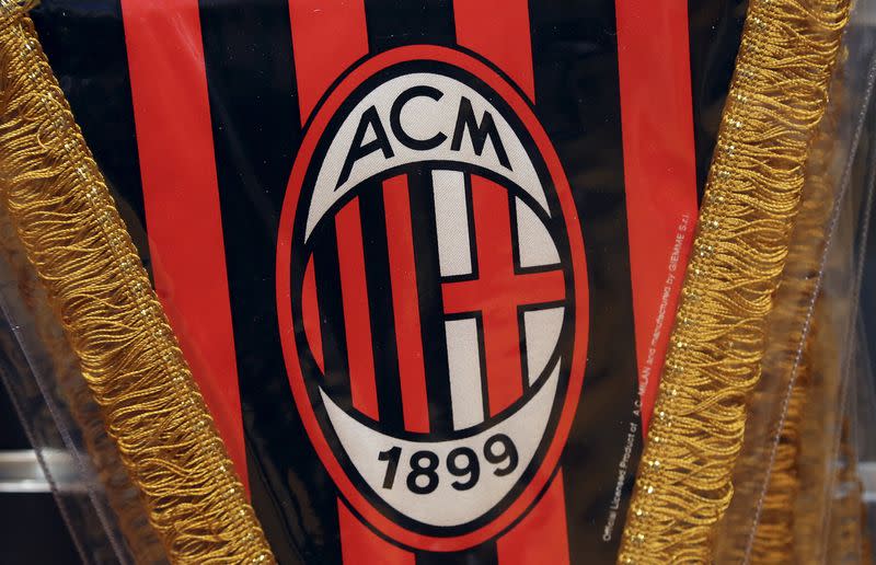 The AC Milan logo is pictured on a pennant in a soccer store downtown Milan