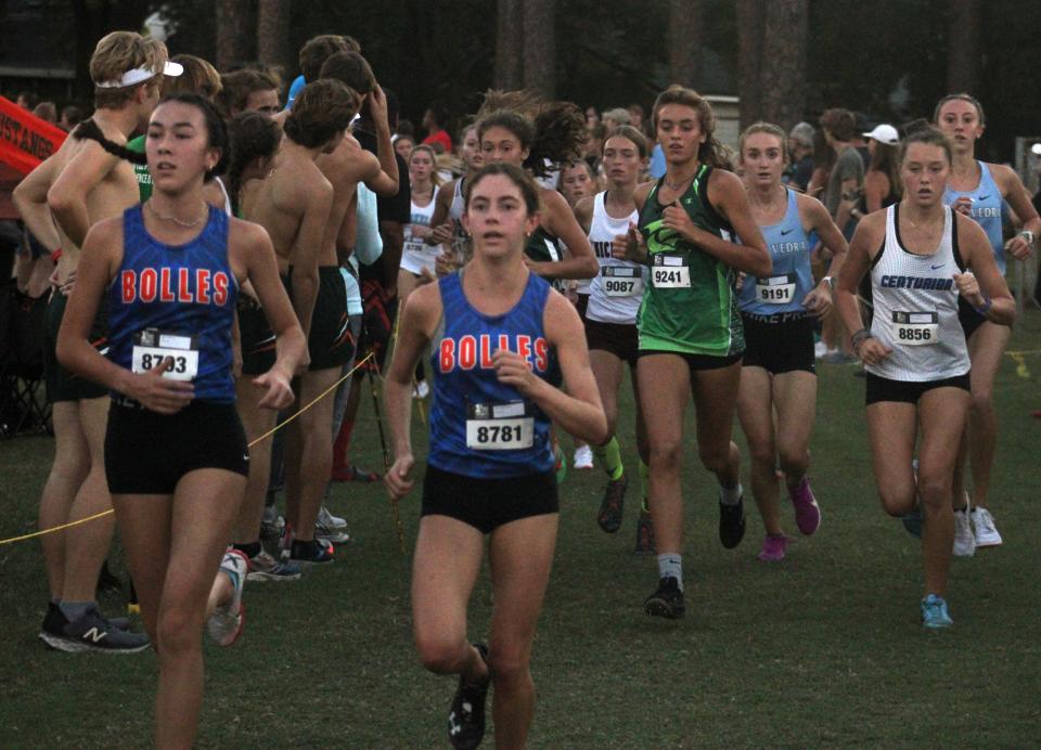 Runners race during the girls elite event at  the Katie Caples Invitational cross country race on September 25, 2021. [Clayton Freeman/Florida Times-Union]