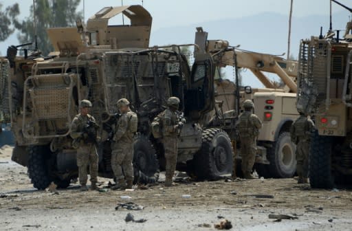 A partial truce in Afghanistan could be a step towards the withdrawal of US troops, seen here at the site of a suicide bomb attack in 2015