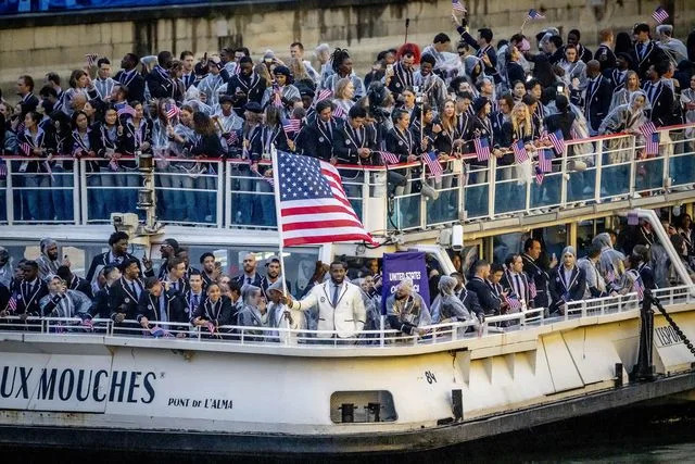 <p>Robin Utrecht/Shutterstock</p> Team USA during the opening ceremony at the 2024 Paris Olympics