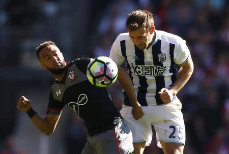 Britain Football Soccer - West Bromwich Albion v Southampton - Premier League - The Hawthorns - 8/4/17 West Bromwich Albion's Craig Dawson in action with Southampton's Nathan Redmond Action Images via Reuters / Peter Cziborra Livepic