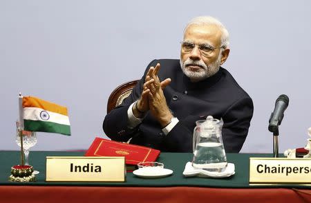 India's Prime Minister Narendra Modi attends the opening session of 18th South Asian Association for Regional Cooperation (SAARC) summit in Kathmandu November 26, 2014. REUTERS/Narendra Shrestha/Pool