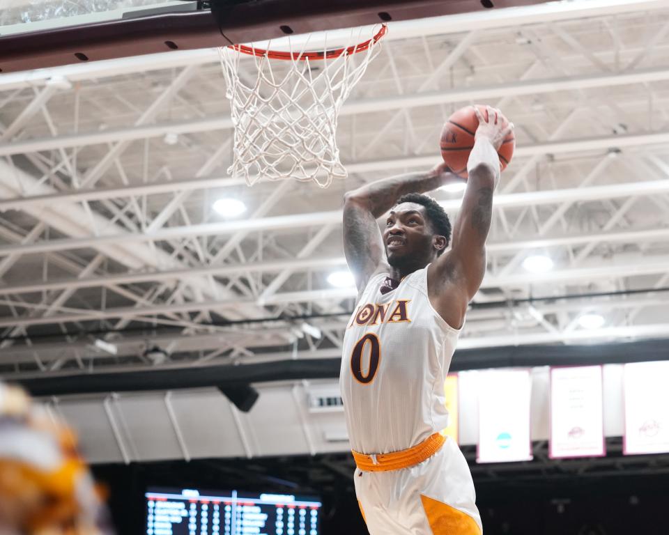 Iona's Berrick JeanLouis rises up for a dunk.