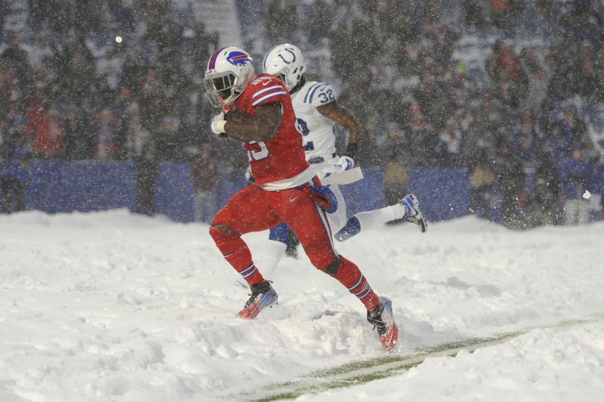 LeSean McCoy had 156 yards rushing and a touchdown in an epic snow game. (AP Photo/Adrian Kraus)