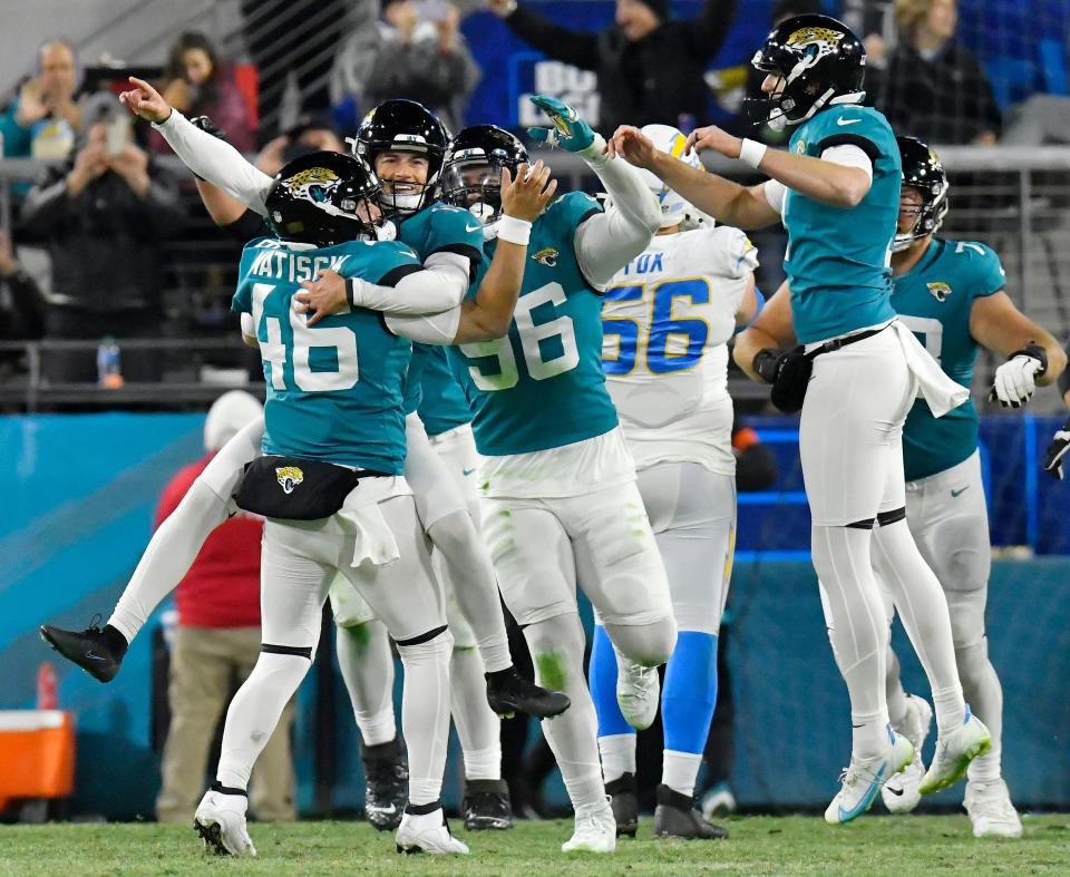 Jaguars' placekicker Riley Patterson, seen here jumping into the arms of long snapper Ross Matiscik (46) in celebration after he kicked the game-winning field goal in a 31-30 AFC wild-card win last season over the Los Angeles Chargers, delivered a moment that raised the team's NFL profile. That's a big reason the league decided to give the Jaguars three prime-time games in the 2023 season.
