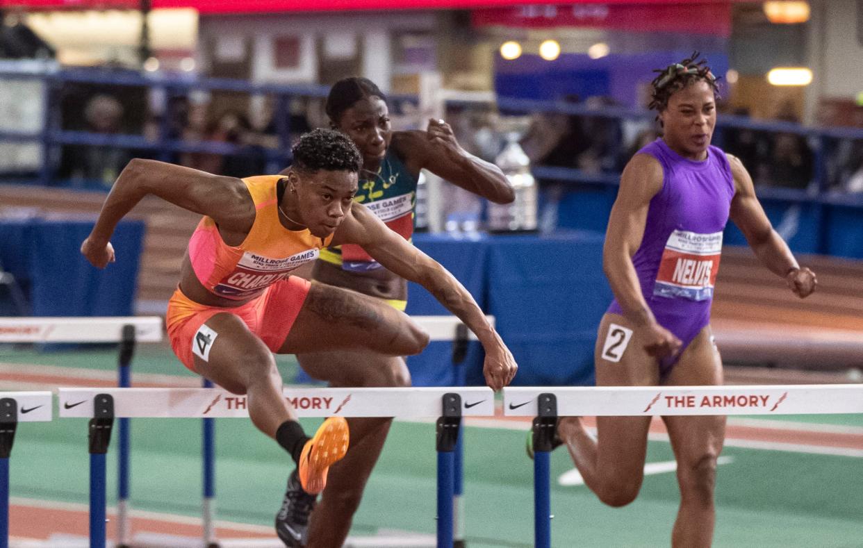 Devynne Charlton of the Bahamas, left, set a new indoor world record with a time of 7.67 in the WomenÕs 60 meter hurdles at the Millrose Games at The Armory in New York City Feb. 11, 2024. Mandatory Credit: Seth Harrison/USA Today Network