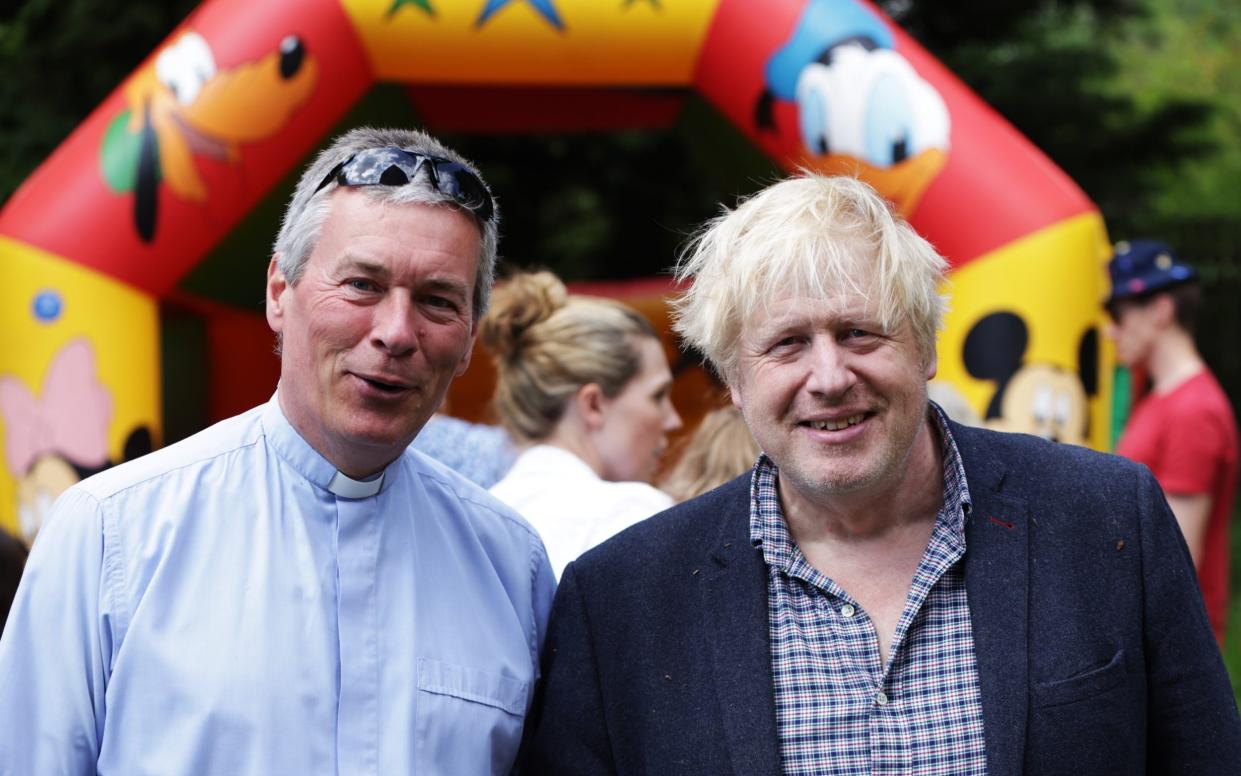 The former prime minister, the present vicar and the inevitable bouncy castle - Ed Nix