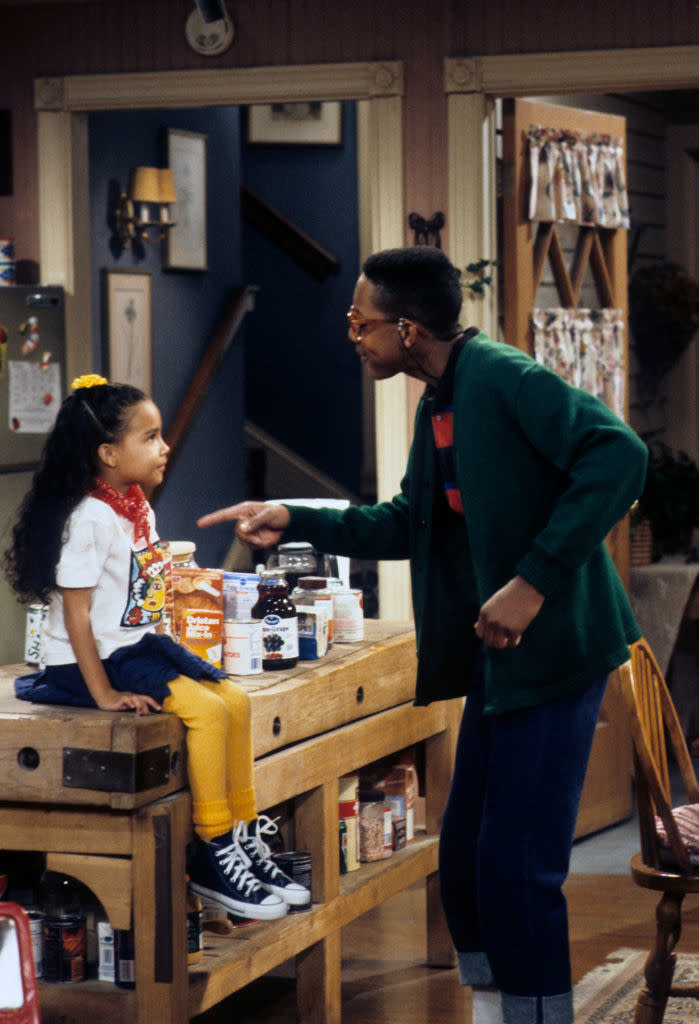 very young Naya as Gwendolyn sitting on a kitchen counter talking to Steve Urkel on "Family Matters"