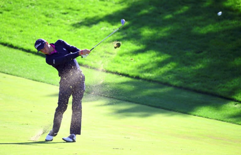 Justin Thomas of the US plays his second shot on the 1st hole during the final round of the CJ Cup, at Nine Bridges on South Korea's Jeju Island, on October 22, 2017