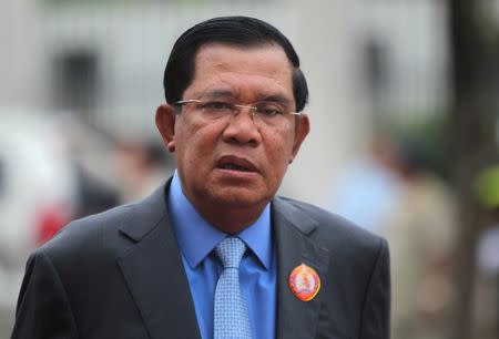 FILE PHOTO: President of the ruling Cambodian People's Party and Prime Minister Hun Sen attends a ceremony to mark the 65th anniversary of the establishment of the party in Phnom Penh June 28, 2016. REUTERS/Samrang Pring/File Photo