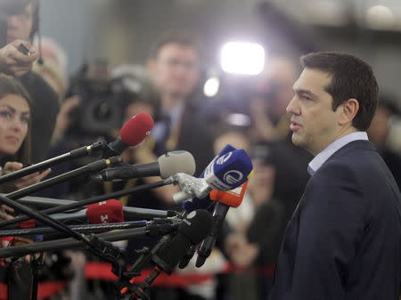 Greece's Prime Minister Alexis Tsipras speaks to members of the media before the Eastern Partnership Summit session in Riga, Latvia, May 22, 2015. REUTERS/Ints Kalnins
