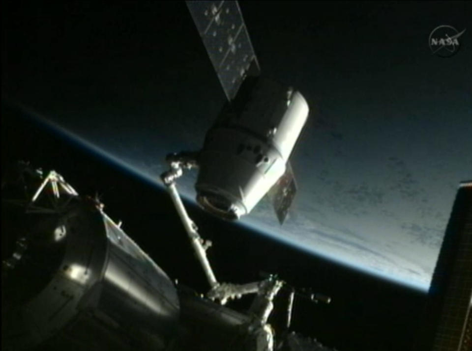 This framegrab image from NASA-TV shows the SpaceX Dragon capsule just after the capsule is backed away from the International Space Station and being repositioned for release later Thursday morning May 31, 2012. The Dragon capsule is scheduled for splashdown at 11:44 a.m. EDT Thursday in the Pacific Ocean. (AP Photo/NASA)